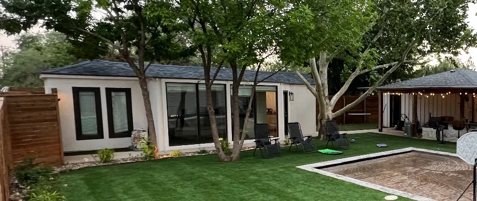 Backyard in Morton, TX, with trees.