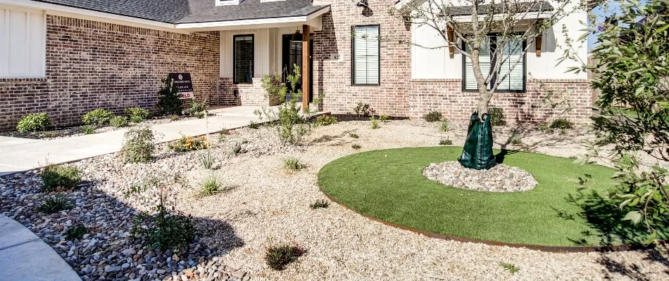 Gravel landscape and artificial turf in Denver City, TX.