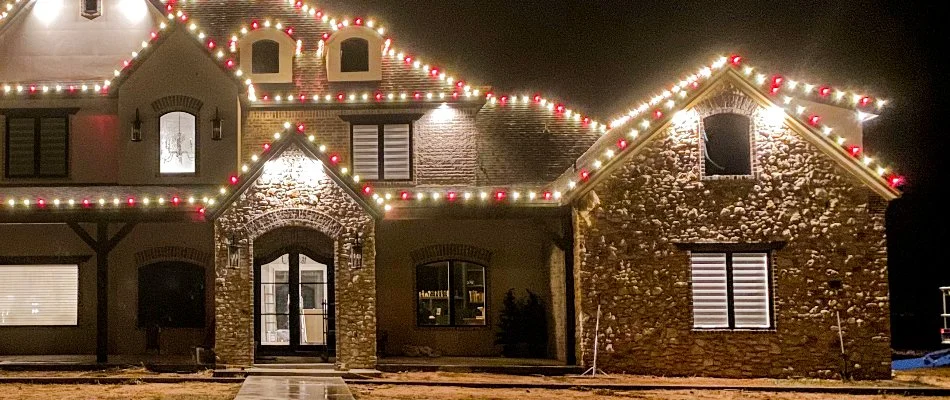 Holiday lights on the eaves of a house in Crosbyton, TX.