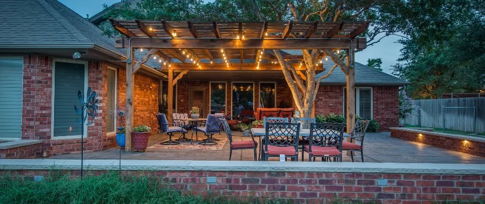 Patio, pergola, with outdoor lighting and outdoor furniture in New Home, TX.