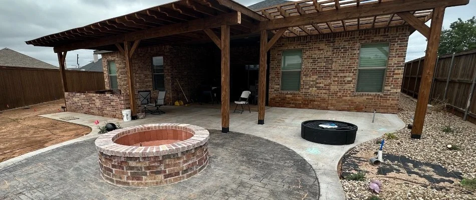 Patio with pergola and fire pit in Hale Center, TX.
