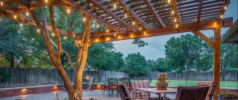 Pergola in Littlefield, TX, with outdoor lighting.