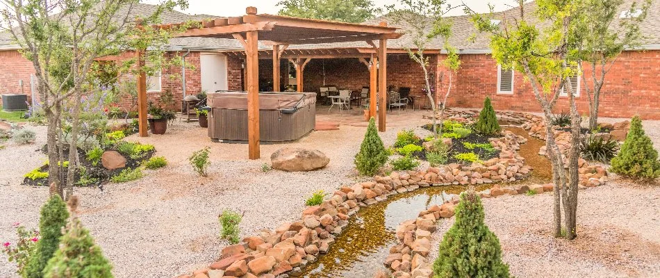 Xeriscaped backyard located in Ransom Canyon, TX.